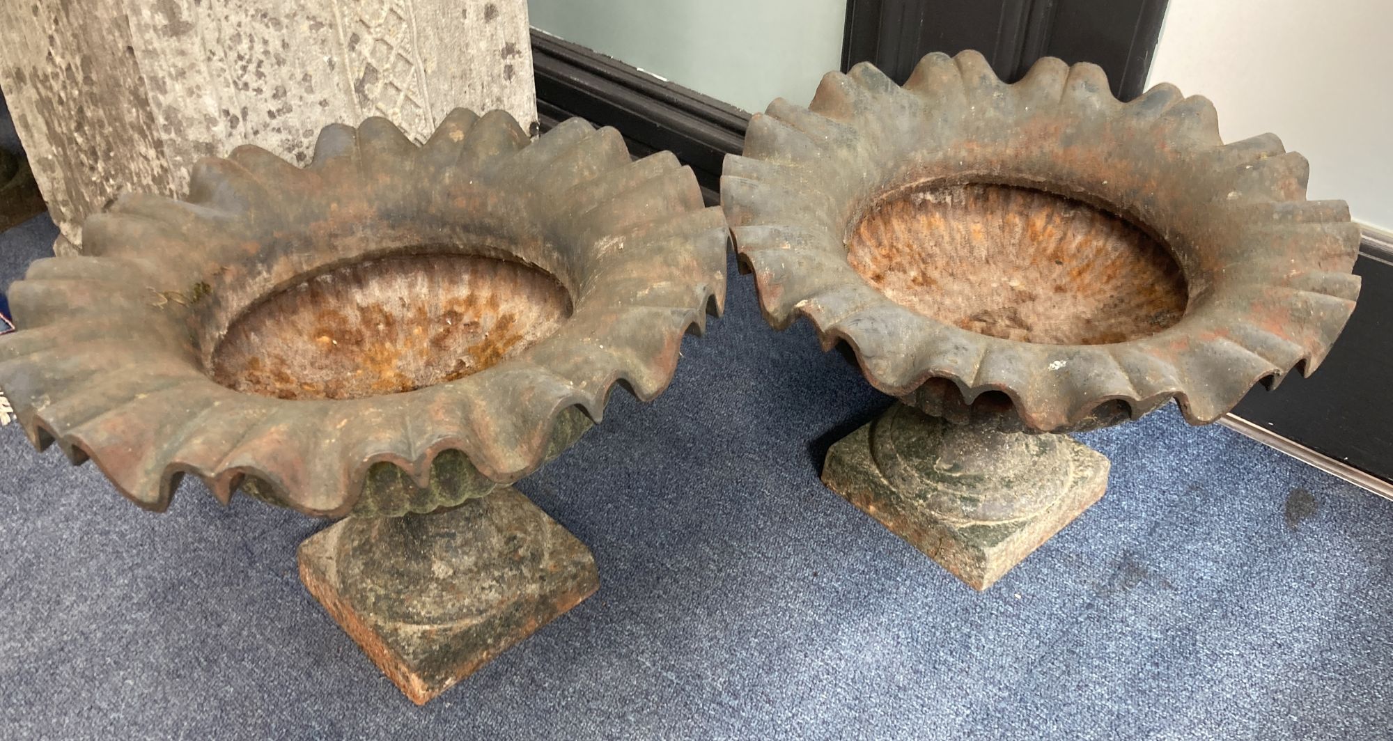 A set of four Victorian style campana cast iron garden urns, diameter 42cm, height 30cm